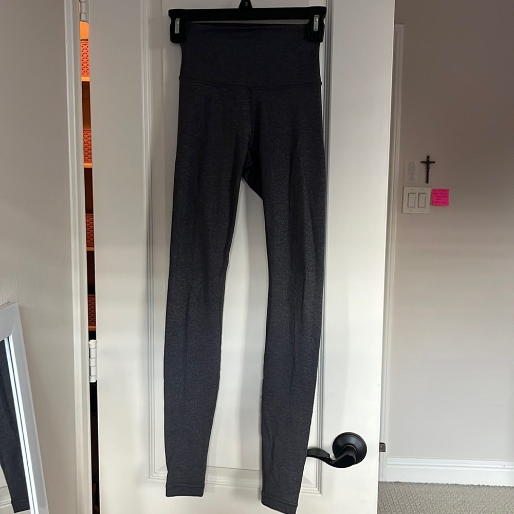 Lululemon grey leggings. Size 2. Stitching is intact.